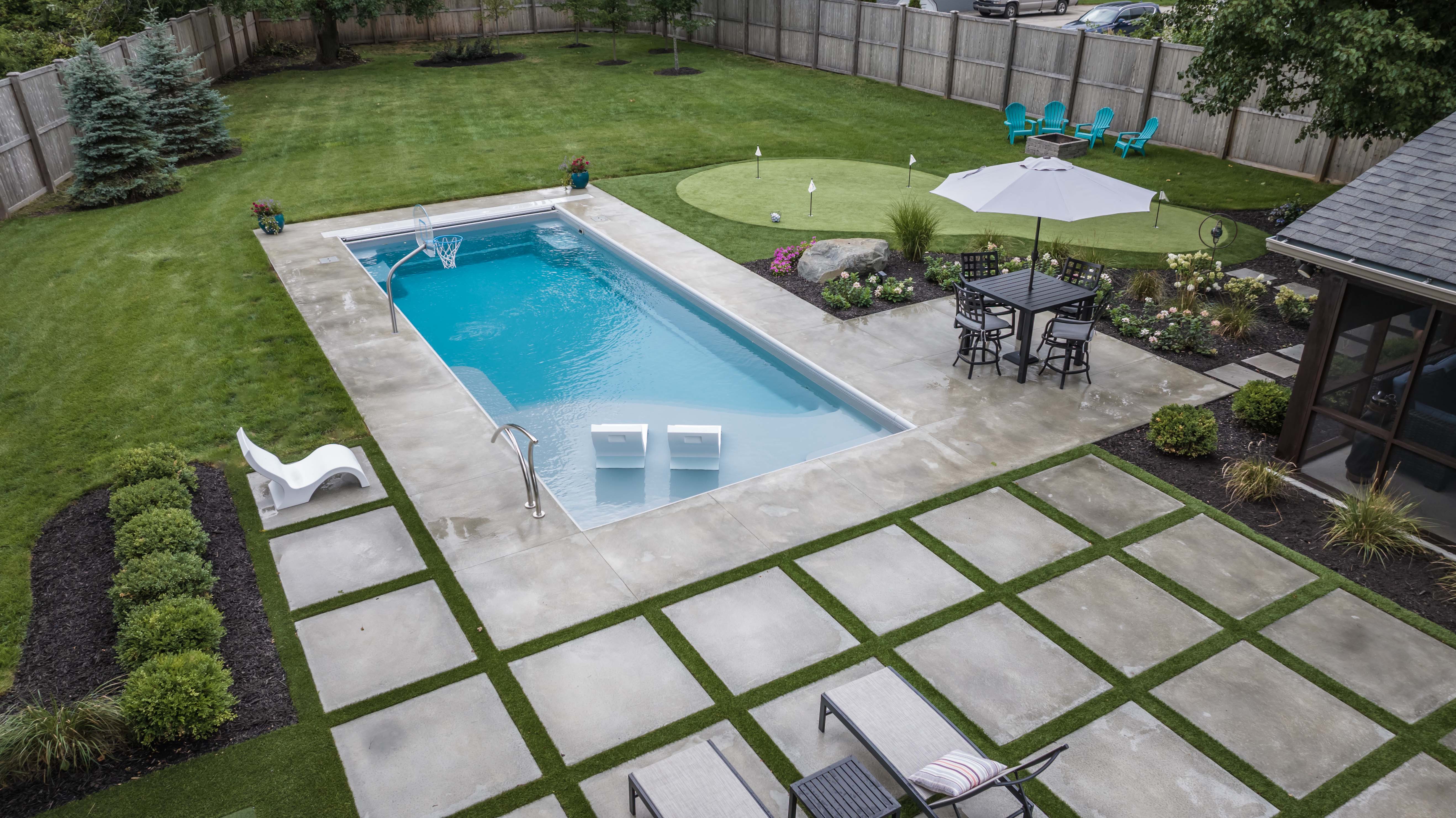 swimming pool with artificial putting green